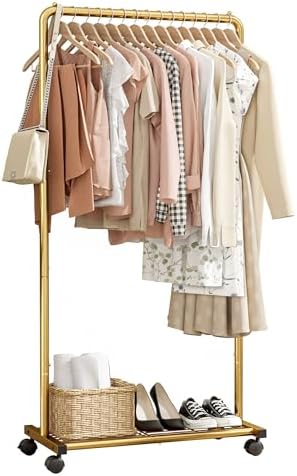 Sakugi Clothes Rack - Clothing Rack with Storage Mesh Shelf & Casters, Heavy-Duty Metal Clothing Rack for Hanging Clothes, Dresses, Coats, Large Load Capacity, Easy Assembly, Gold, 28.0"x16.9"x59.0" by Sakugi