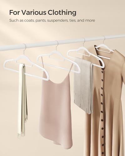 SONGMICS Pack of 50 Coat Hangers, Space-Saving Plastic Clothes Hangers | Non-Slip, 0.2 Inches Slim, 16.5 Inches Wide, 360° Swivel Silver Hook, White, UCRP20WT50 - Image 7